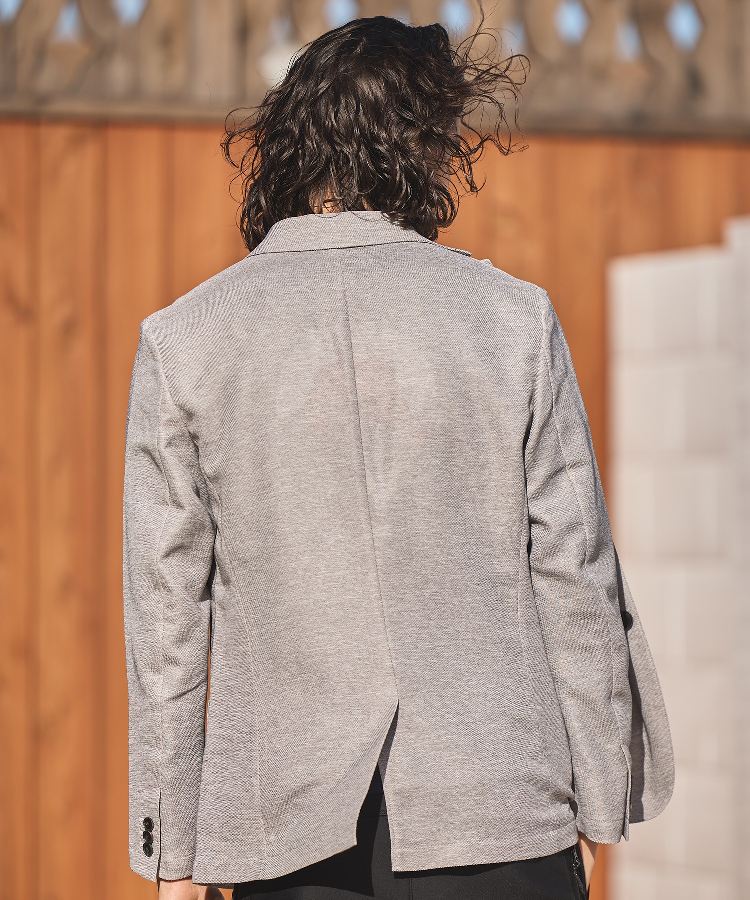 カラミノッチドラペルジャケット