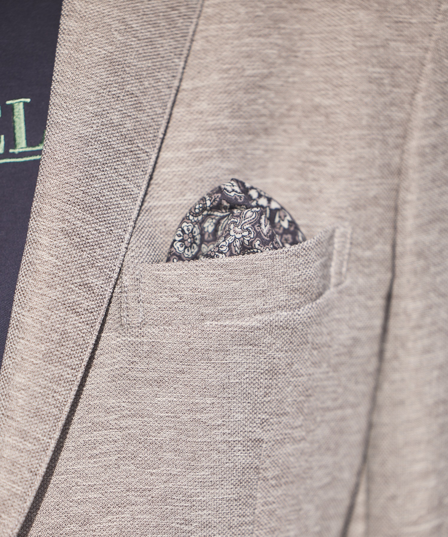 カラミノッチドラペルジャケット