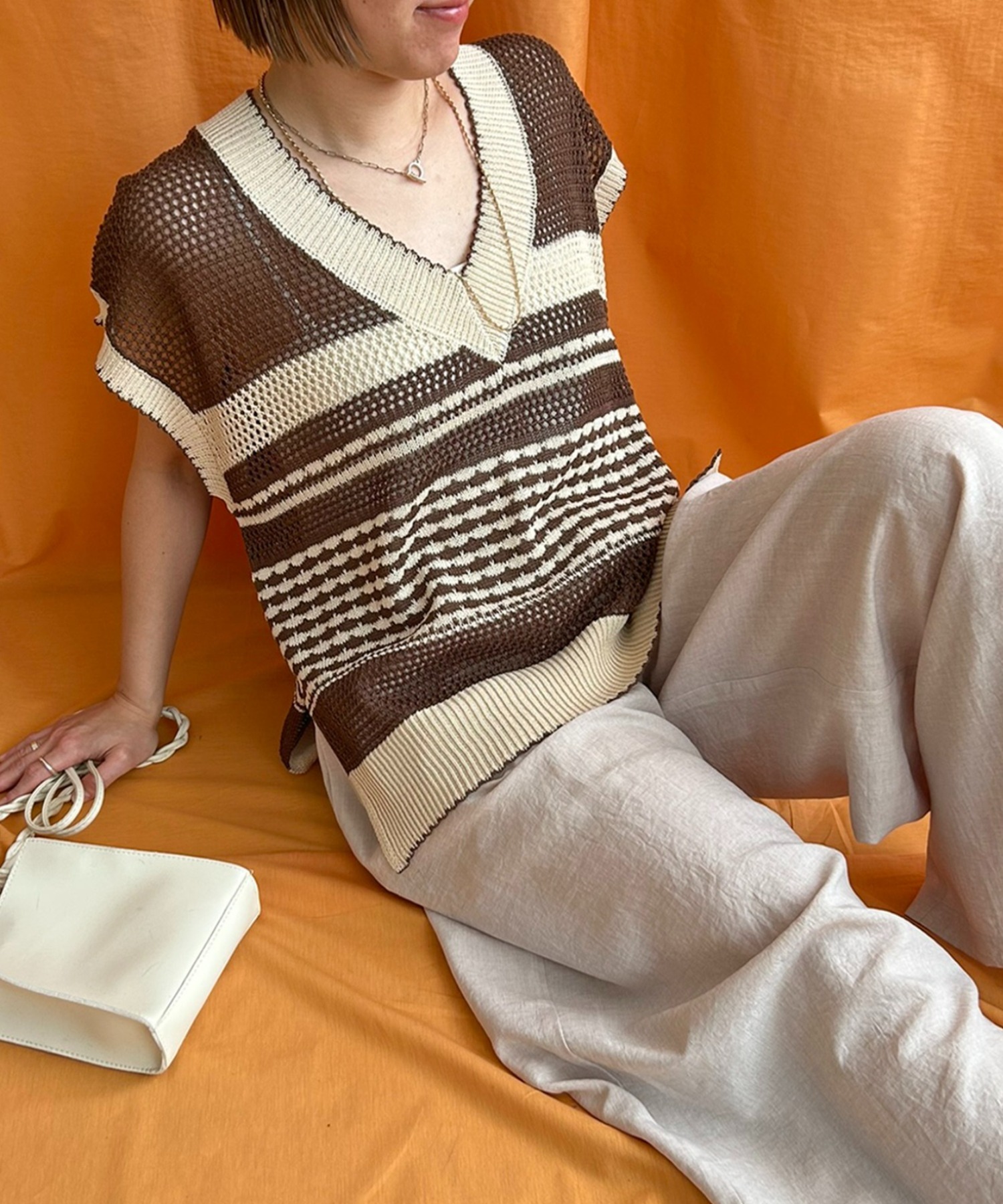 バイカラーメッシュニットベスト LHELBIE│Eimee Law & LHELBIE