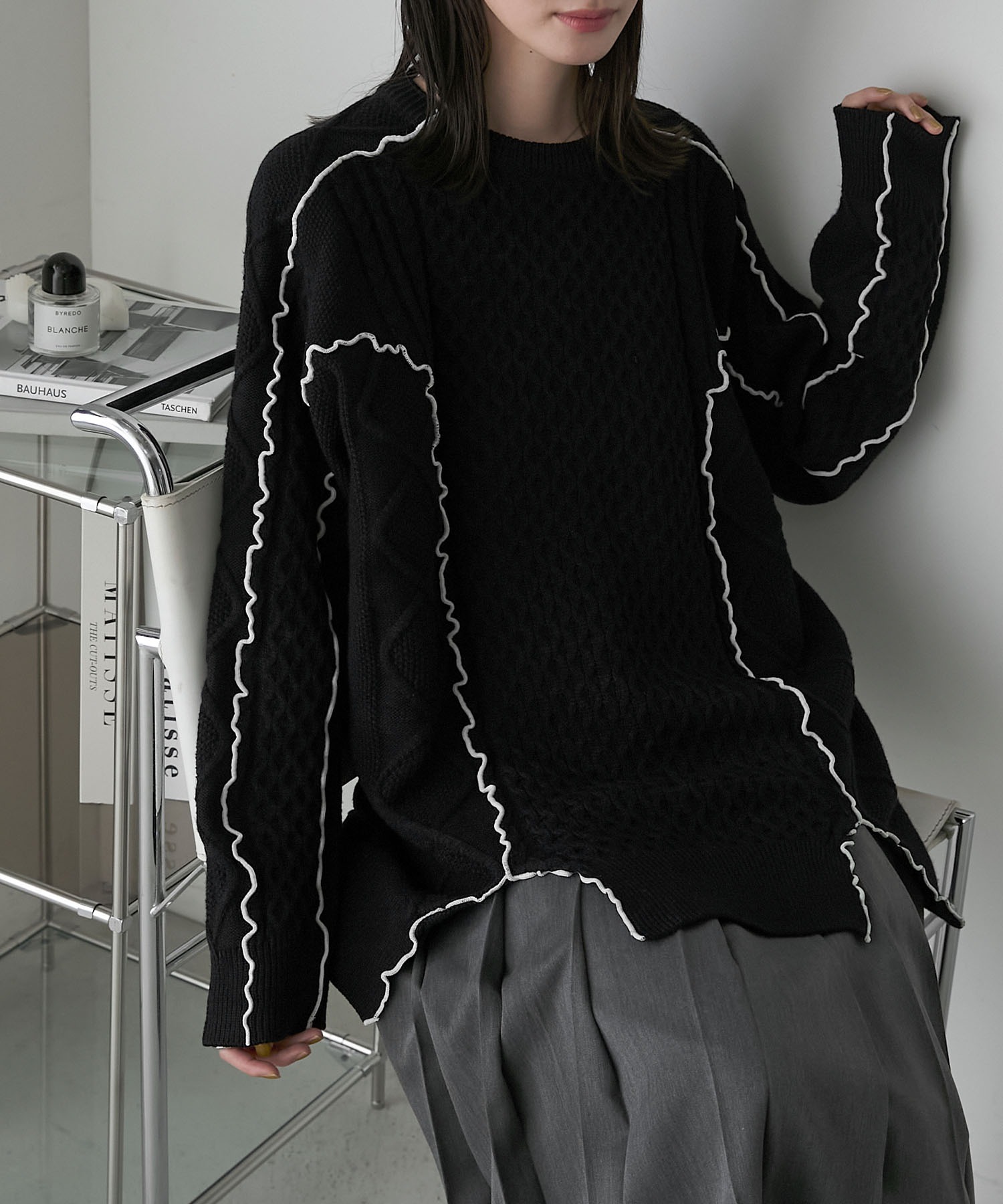 とれあ　HERG1 ケーブルニットブルゾン.黒ニット とれあ HERG1 ケーブルニットブルゾン.黒ニット 編地切替ケーブル