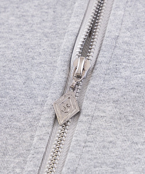 A'GEM/9 × .kom 『SUPPLIER/サプライヤー』 Pierced Tribal Cross Zip