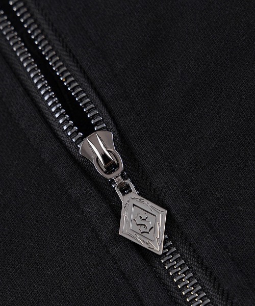 A'GEM/9 × .kom 『SUPPLIER/サプライヤー』 Pierced Tribal Cross Zip
