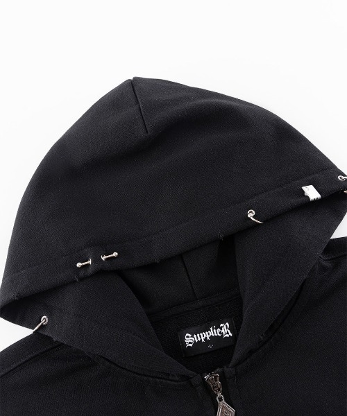 A'GEM/9 × .kom 『SUPPLIER/サプライヤー』 Pierced Tribal Cross Zip