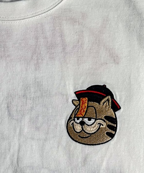 A'GEM/9 × .kom 『A'gem/エージェム』バックアイコン刺繍半袖Tシャツ A