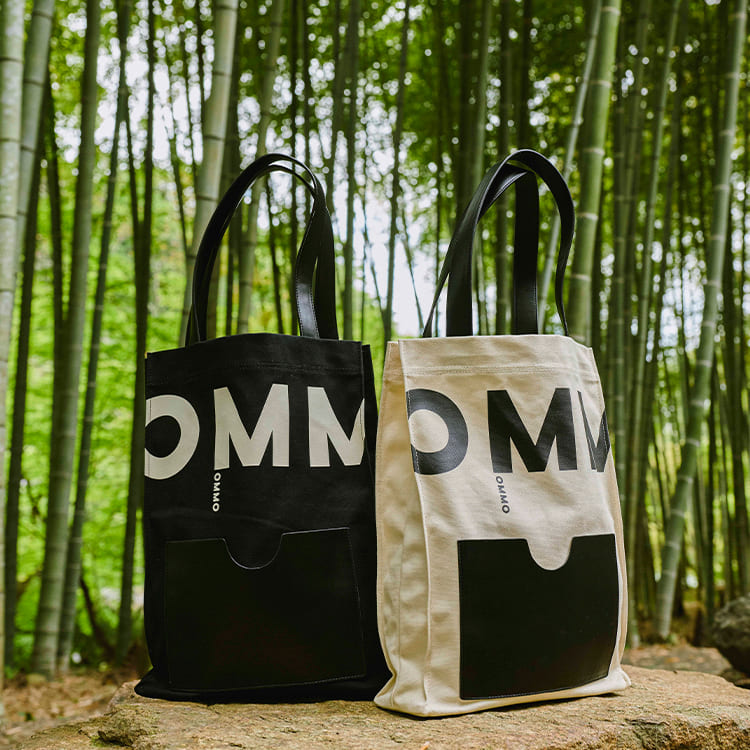 OMMO�i�I�[�G���G���I�[�j�̃V���b�v�j���[�X�uOMMO�f�r���[�V�[�Y���ȗ��̃L�����o�XLOGO TOTE�v