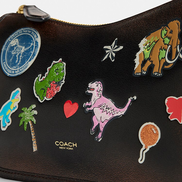 COACH�i�R�[�`�j�̃V���b�v�j���[�X�u�g���L�V�[�h10���N�R���N�V�����^COACH�v